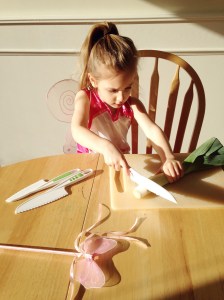 Chopping leeks in the morning sun for our breakfast